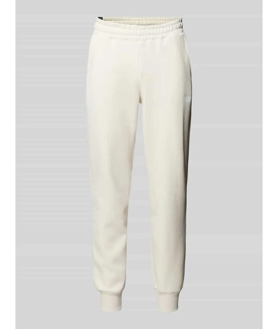 obrazek 1 Spodnie dresowe o kroju relaxed fit z nadrukiem z logo