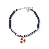Picture Bracelet made of rhodium-plated silver, blue lapis and mother of pearl. Pendant finished with white and red enamel
