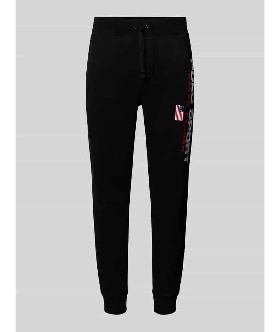 obrazek 1 Spodnie dresowe o kroju slim fit z nadrukiem z logo
