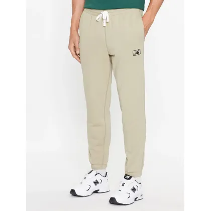 Zdjęcie New Balance Spodnie dresowe NB Essentials Sweatpant MP33509 Zielony Regular Fit