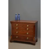 Picture Mahogany George III chest of drawers with shaped drawers