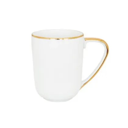 Zdjęcie Piękny porcelanowy kubek ze złotym zdobieniem