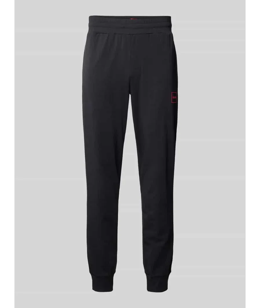 obrazek 1 Spodnie dresowe o kroju slim fit z naszywką z logo model ‘Laze’