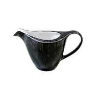 Picture High-quality porcelain creamer for the dining room