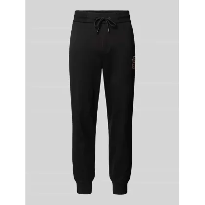 Zdjęcie Spodnie dresowe o kroju relaxed fit z naszywką z logo model ‘Lamont’