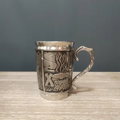 Picture A tin mug depicting the Irish legend of the Salmon of Knowledge