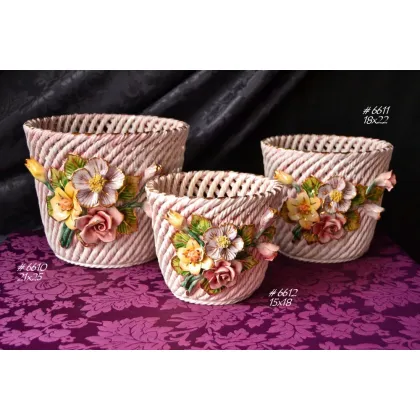 Picture Stylish decorative baskets made of ceramics and floral decorations