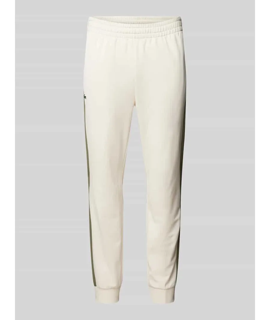 obrazek 1 Spodnie dresowe o kroju slim fit z elastycznym pasem