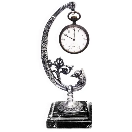 Picture Beautiful desk decoration - a peacock with a clock