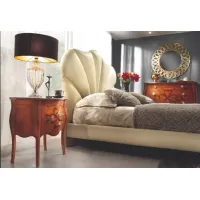 Picture A chic bedroom bed finished with smoked cherry
