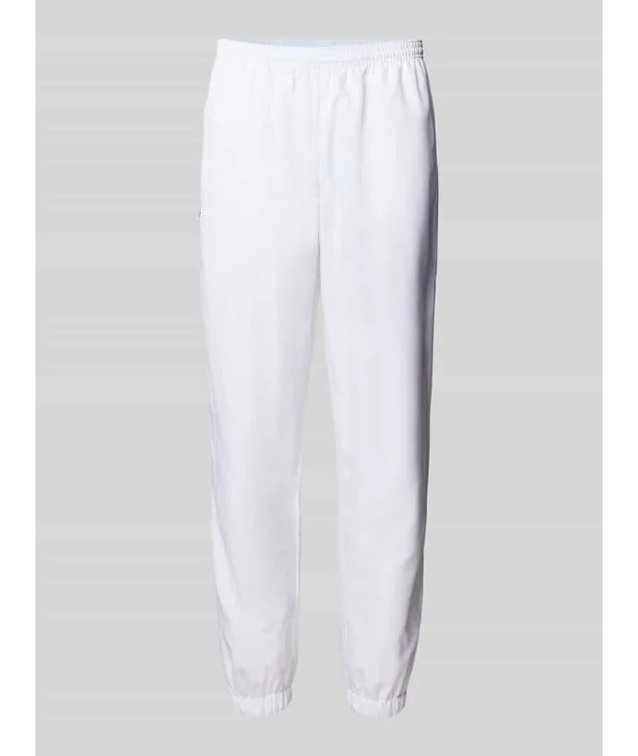 obrazek 1 Spodnie treningowe o kroju relaxed fit z naszywką z logo