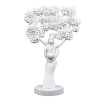 Picture A unique sculpture of the tree of life with the figure of a man and a woman