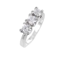 Picture Trilogy ring made of gold with three unique diamonds