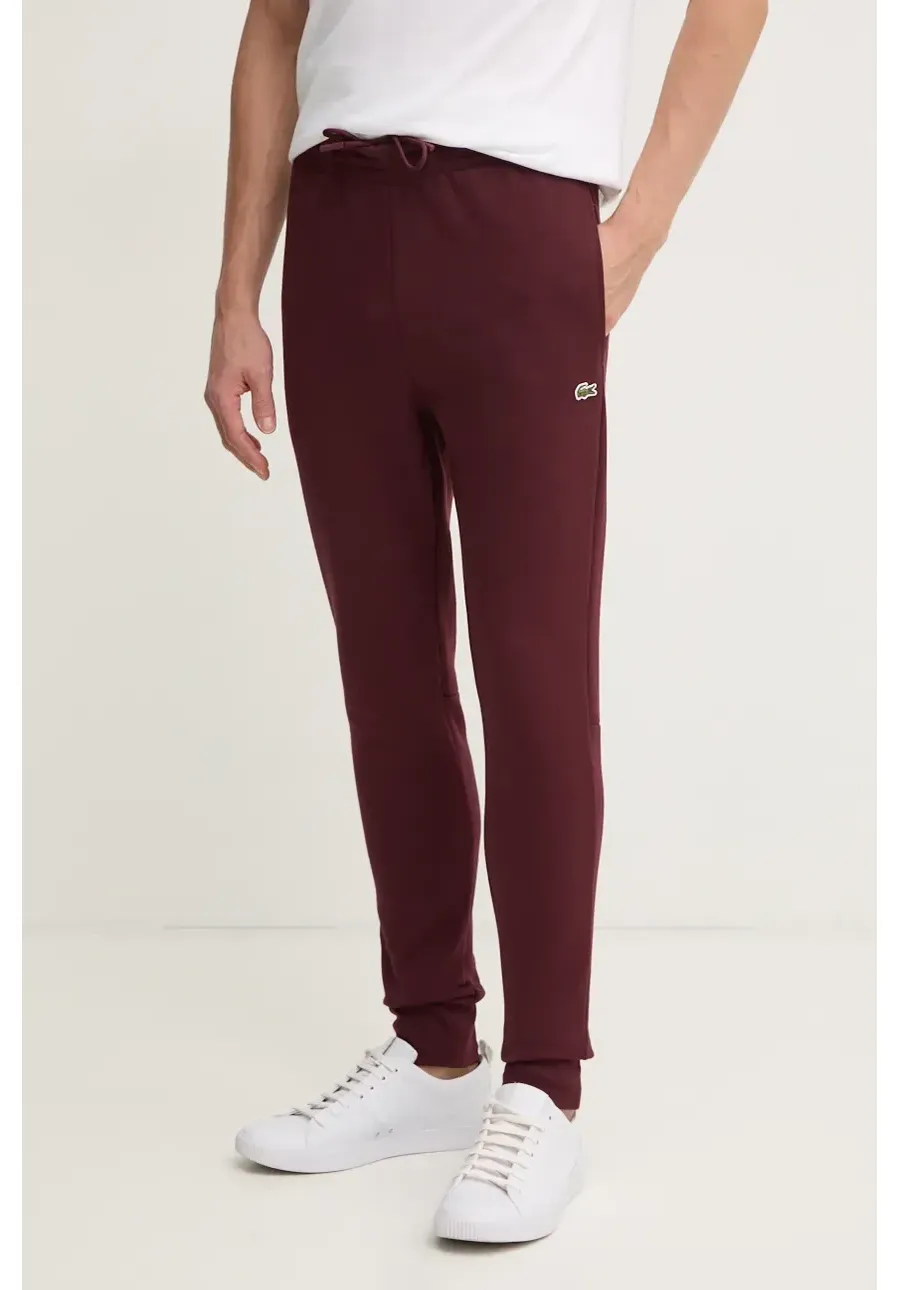 obrazek 1 Lacoste spodnie dresowe kolor bordowy gładkie
