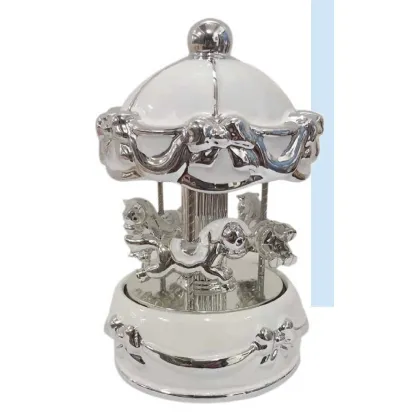 Picture Beautiful silver music box in the shape of a carousel with LED lights