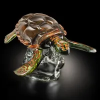 Picture Green amber turtle on a crystal base
