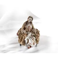 Zdjęcie Figurka kobiety na fotelu - Sibania