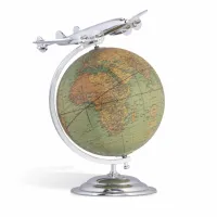 Picture A unique globe with a miniature of the plane