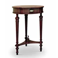 Picture A tall antique table with a lamp for the living room