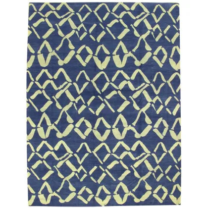 Zdjęcie Ciemnoniebieski dywan z wełny z romboidalnym wzorem
