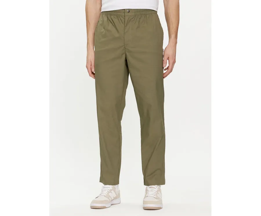 obrazek 1 New Balance Spodnie dresowe MP41575 Zielony Regular Fit