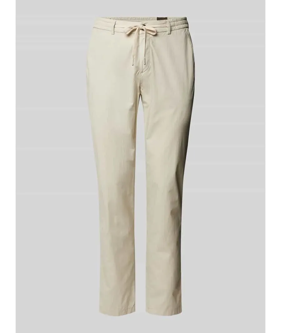 obrazek 1 Spodnie o kroju slim fit w jednolitym kolorze model ‘TAIKAN’