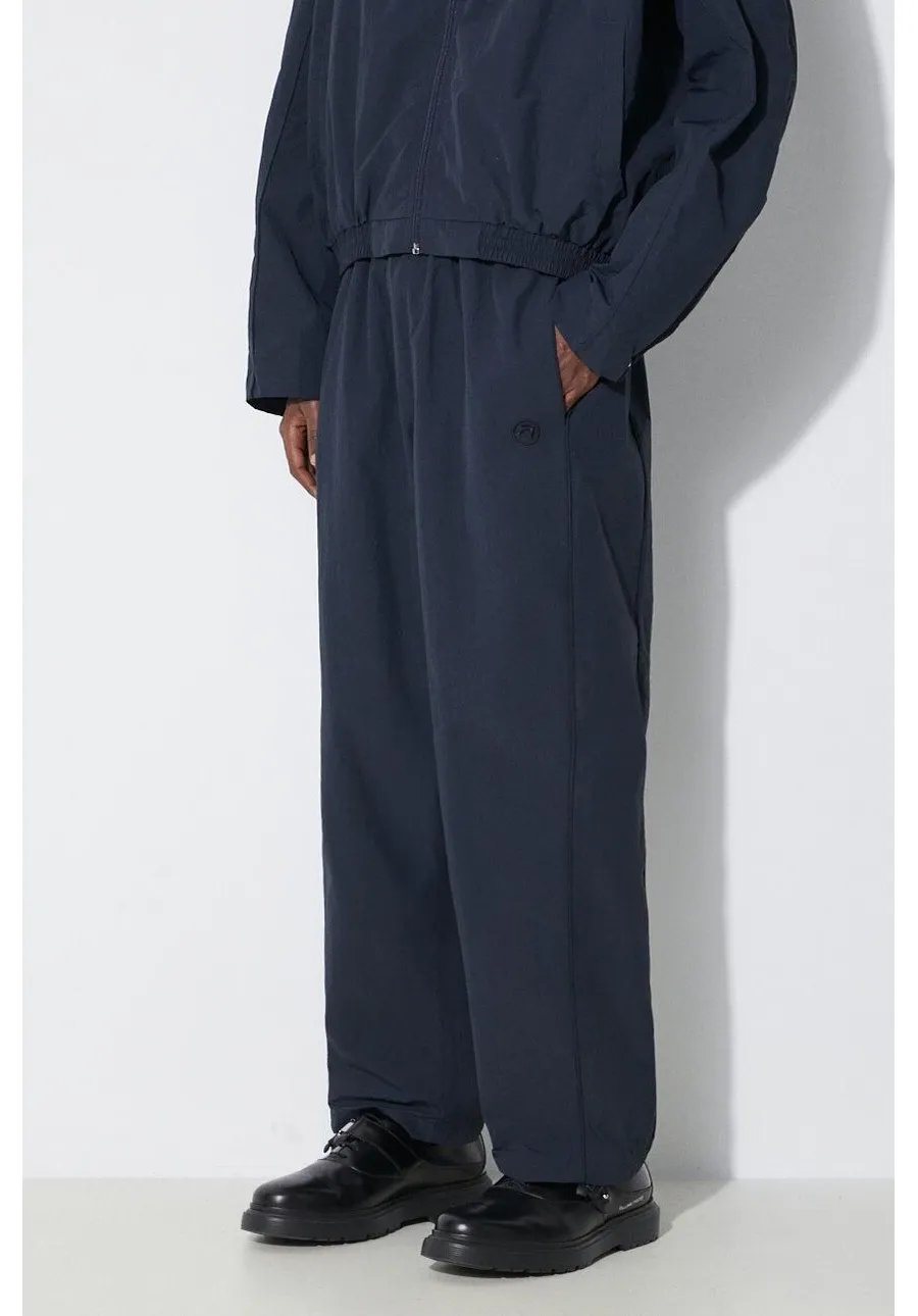 obrazek 1 AMBUSH spodnie Nylon Track Pants męskie kolor granatowy proste BMCJ002S24FAB