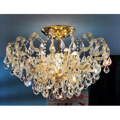 Zdjęcie Ekskluzywny żyrandol Mariateresa z pozłacaną metalową ramą pokrytą szklanymi ramionami i przezroczystymi kryształowymi zawieszkami - Il Paralume Marina