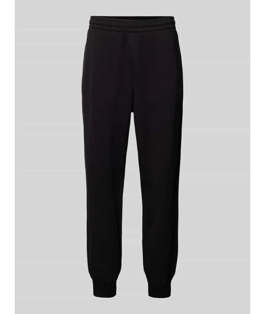 obrazek 1 Spodnie dresowe o kroju relaxed fit z nadrukiem z logo model ‘TRAIN VISIBILTY’