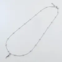 Picture Original necklace with a pendant in the shape of a horn of happiness