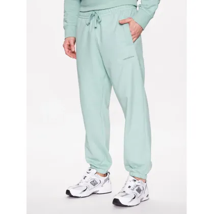 Zdjęcie New Balance Spodnie dresowe MP23551 Zielony Relaxed Fit