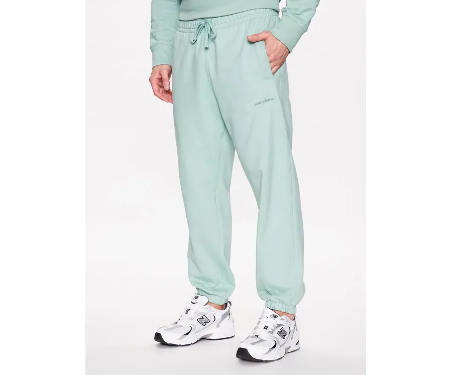 obrazek 1 New Balance Spodnie dresowe MP23551 Zielony Relaxed Fit