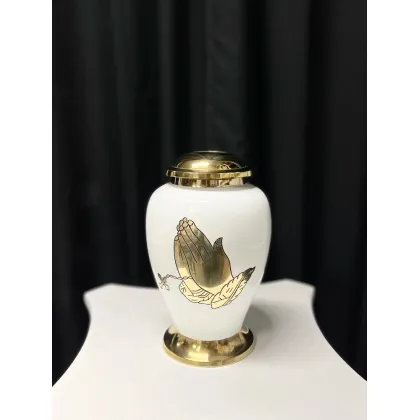 Picture Beautiful white urn with gold decorations