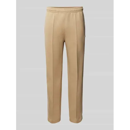 Zdjęcie Spodnie dresowe o kroju slim fit z naszywką z logo