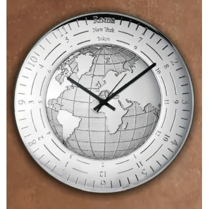 Picture A beautiful silver clock with a representation of the globe