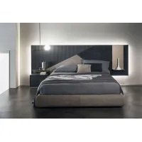 Picture Original Italian upholstered bed in a minimalist style for the bedroom