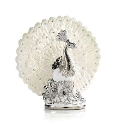 Picture Stylish peacock made of ceramics - interior decoration
