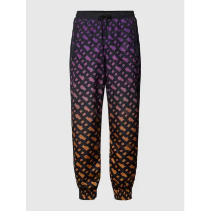 Zdjęcie Spodnie dresowe z logo na całej powierzchni model ‘LAME’