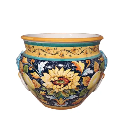 Picture A unique Italian vase decorated with sunflowers on a dark background