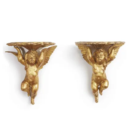 Picture A pair of 19th century Italian carved and gilded Putti brackets