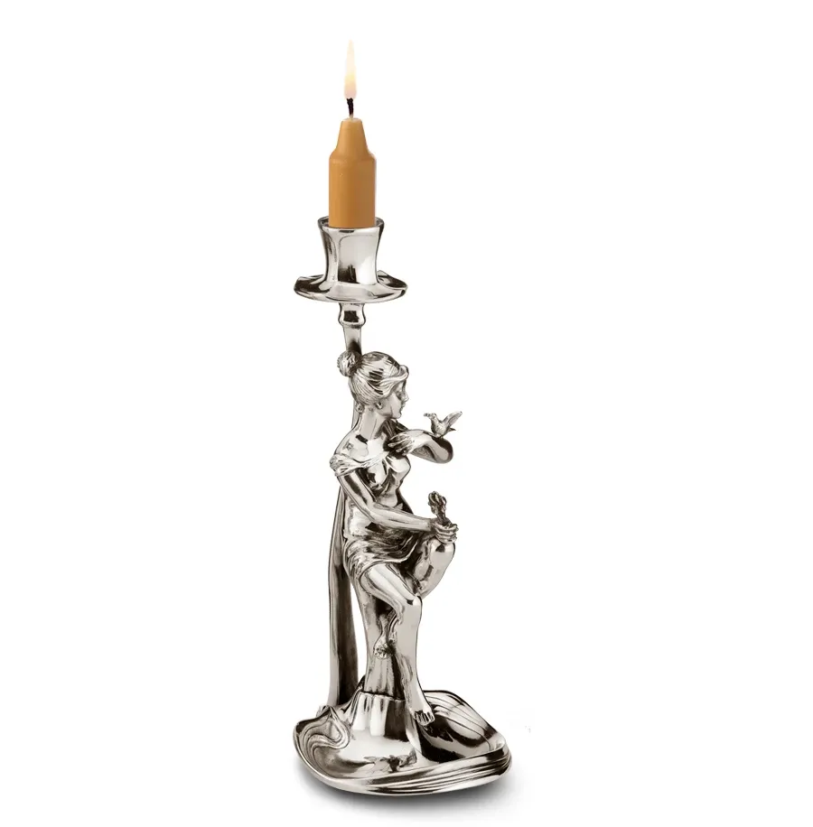 picture 1 Pewter candle holder with a woman holding a bouquet of flowers