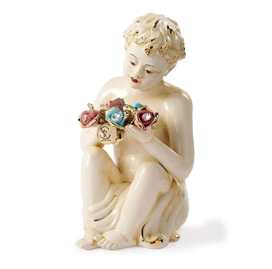 obrazek 1 Ceramiczna figurka chłopca z bukietem róż