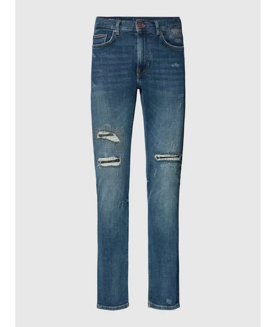 obrazek 1 Jeansy o kroju slim fit z przetarciami model ‘BLEECKER’