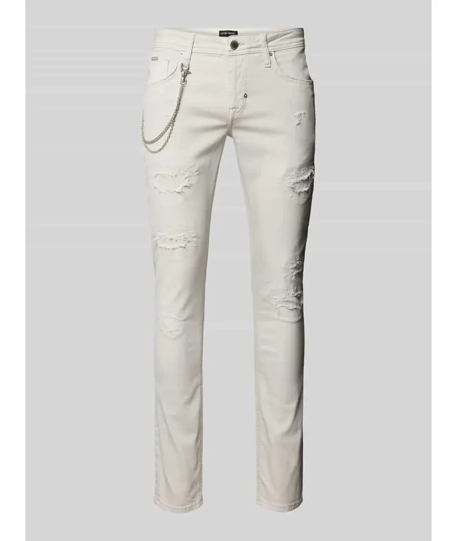 obrazek 1 Jeansy o kroju tapered fit z łańcuszkiem