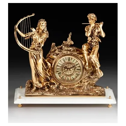 Picture A unique clock with musicians made of bronze