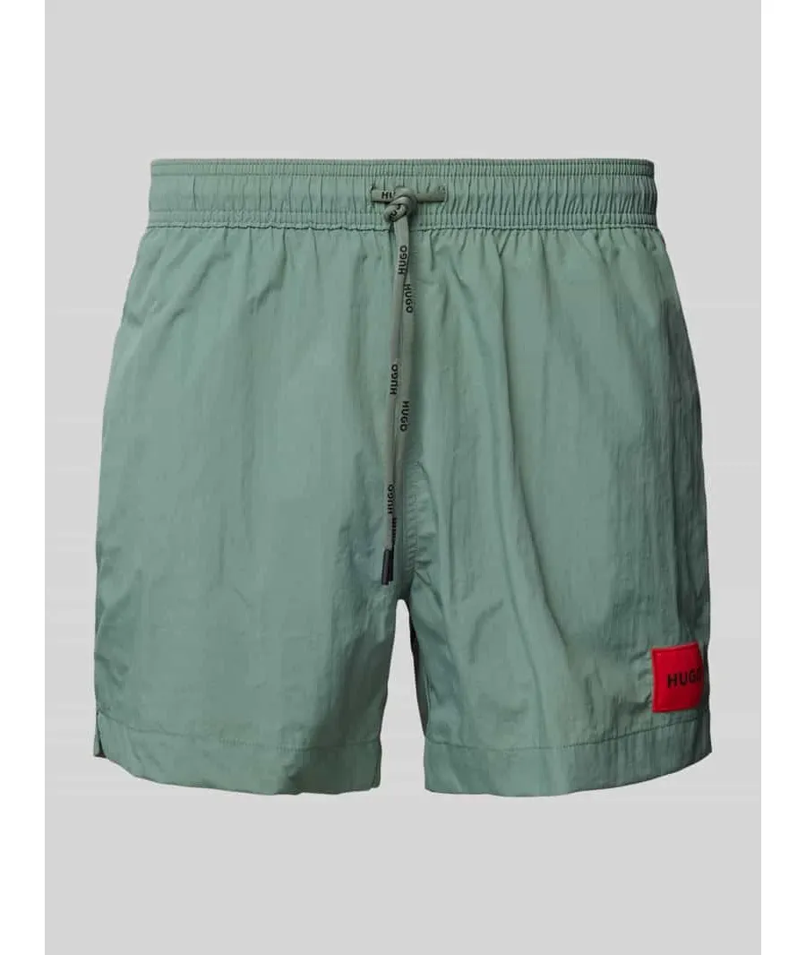 obrazek 1 Spodenki kąpielowe o kroju regular fit z naszywką logo model ‘Dominica’