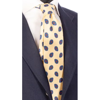 Zdjęcie Ciekawy krawat dla mężczyzn w bladożółtym kolorze z niebiesko-pomarańczowym wzorem