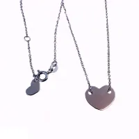 Picture A chain with a heart passing through a 44 cm plate