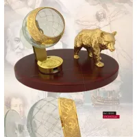 Picture Alcohol warmer with a bear figurine on the desk