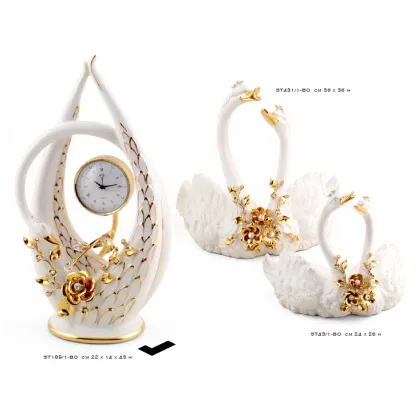 Picture Luxurious ceramic clock with gold accessories - Bruno Costenaro